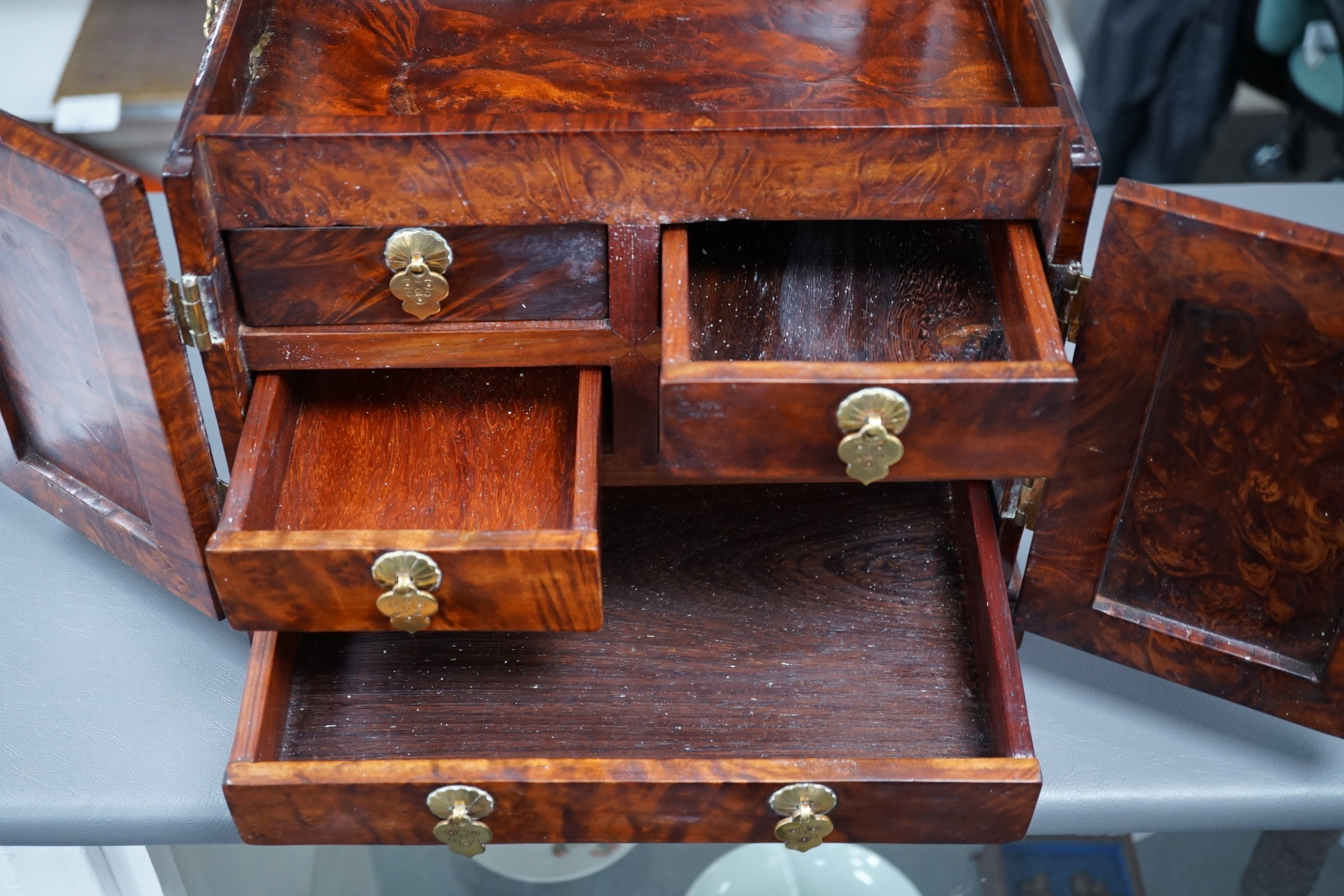 A Chinese burrwood scholar's cabinet, 19th century